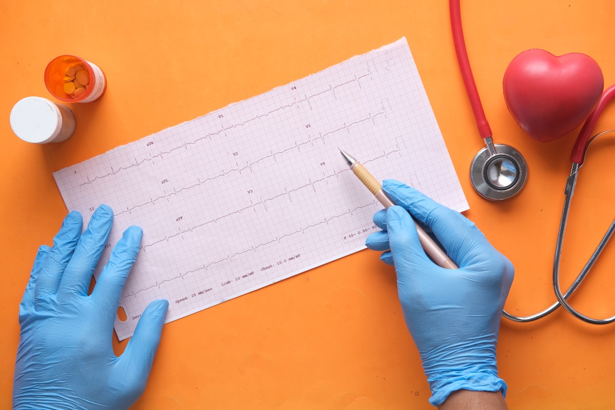 Young man experiencing chest pain - myocarditis symptoms