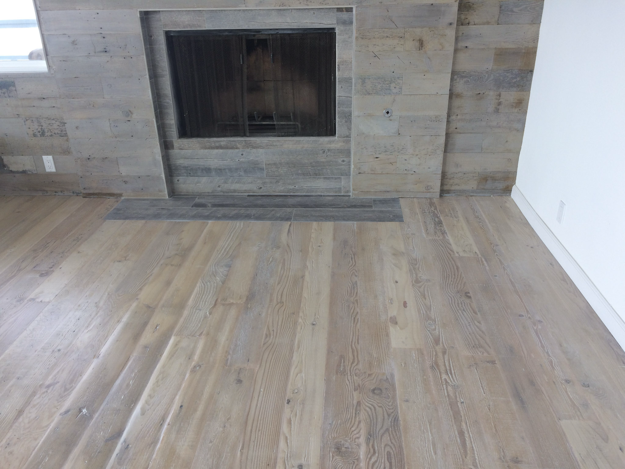 Reclaimed Douglas Fir Flooring with Fireplace Feature Wall