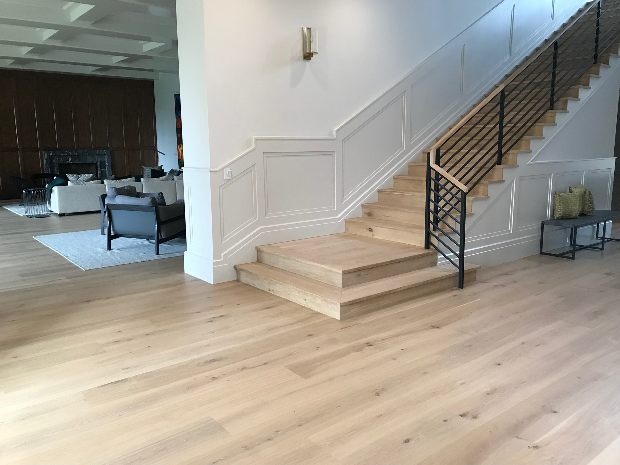 Custom Hardwood Flooring Installation with Staircase Feature