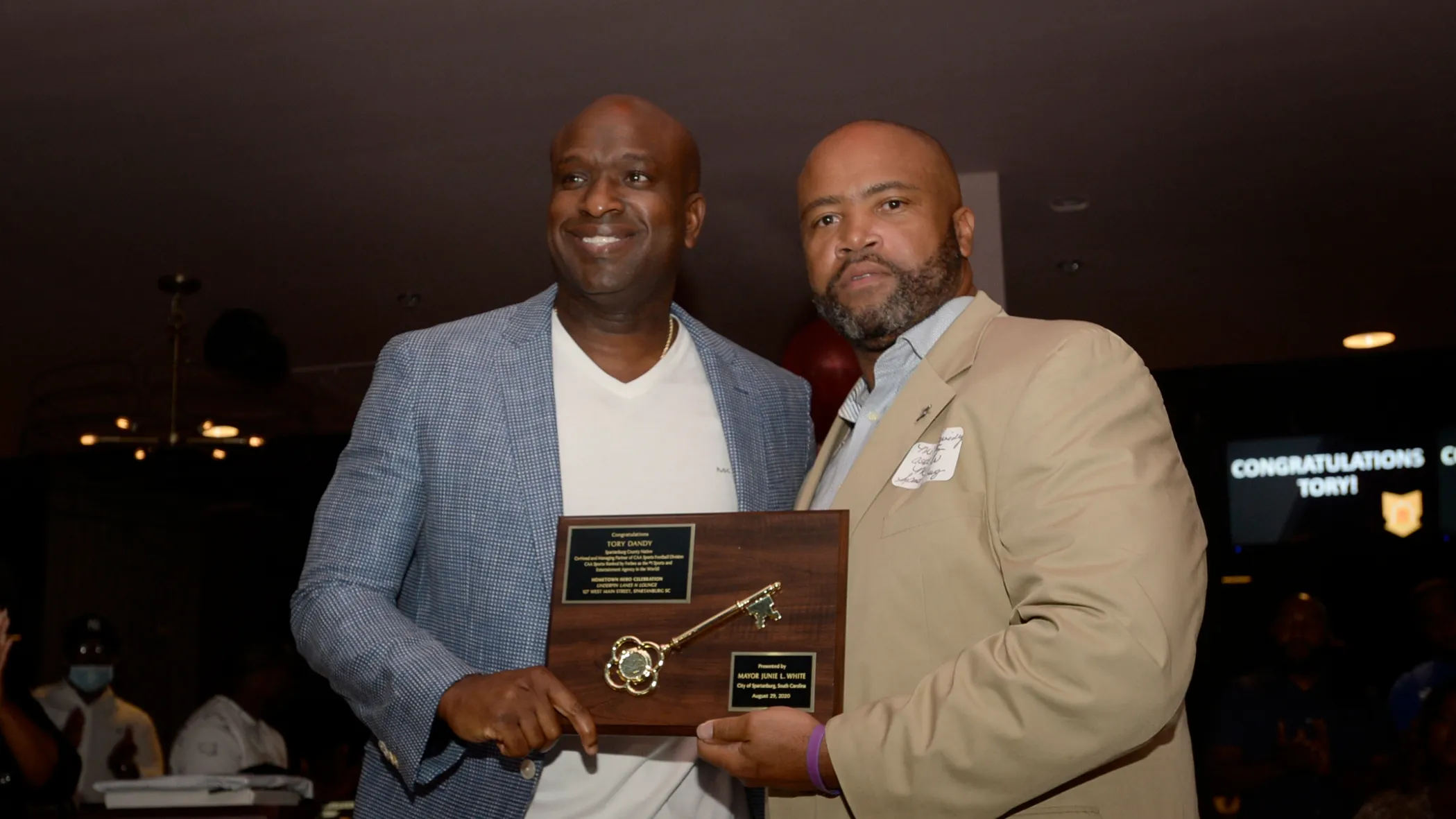 Tory Dandy presenting the scholarship award